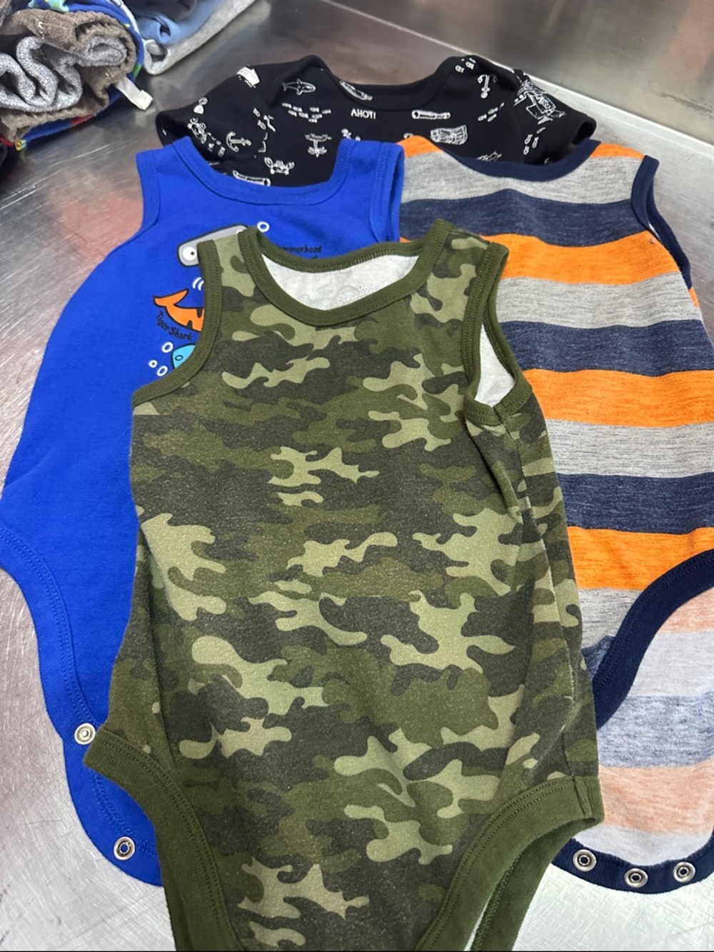 Baby Tank Onesie 4pcs Bundle- Camo, Royal Blue, Navy/Orange Stripe. 12/18mths